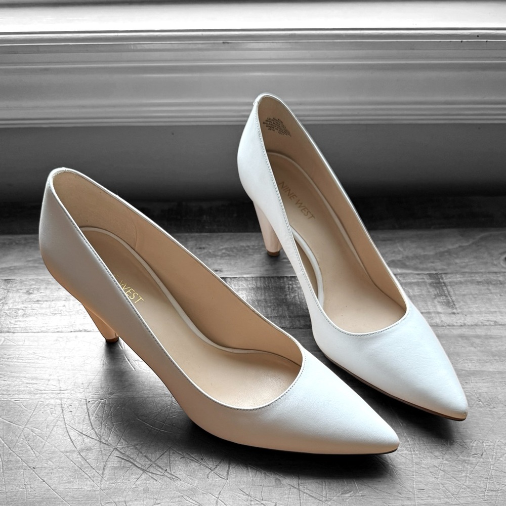 White leather heels, size 8.5